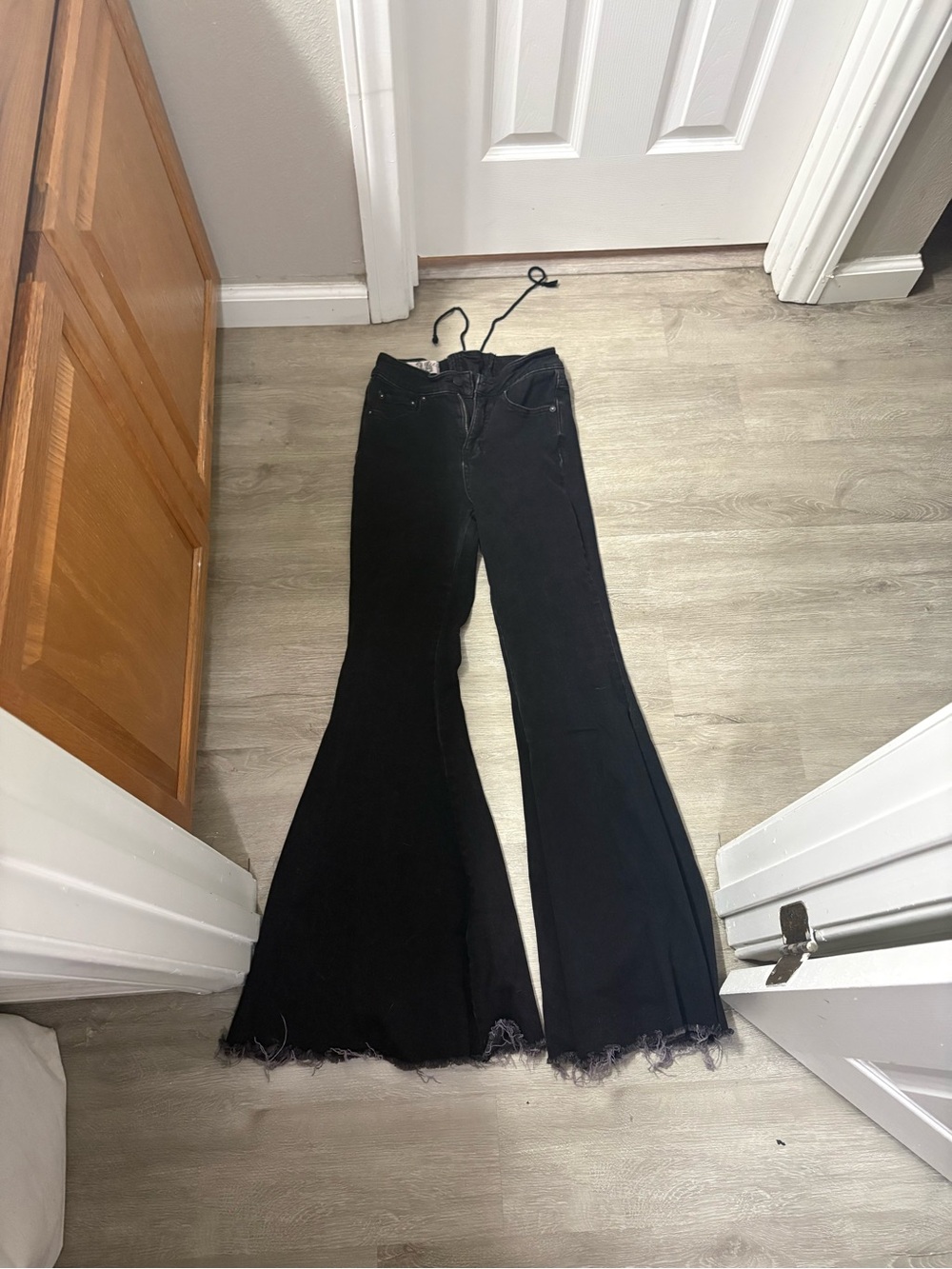 We The Free Black Wide-Leg Flare Jeans with Frayed Hem